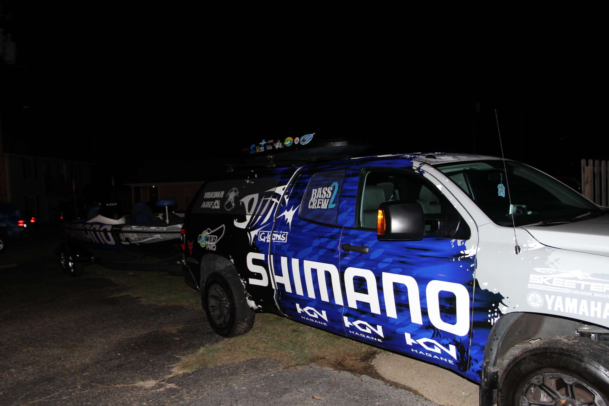 A Shimano-wrapped truck and boat are on display.