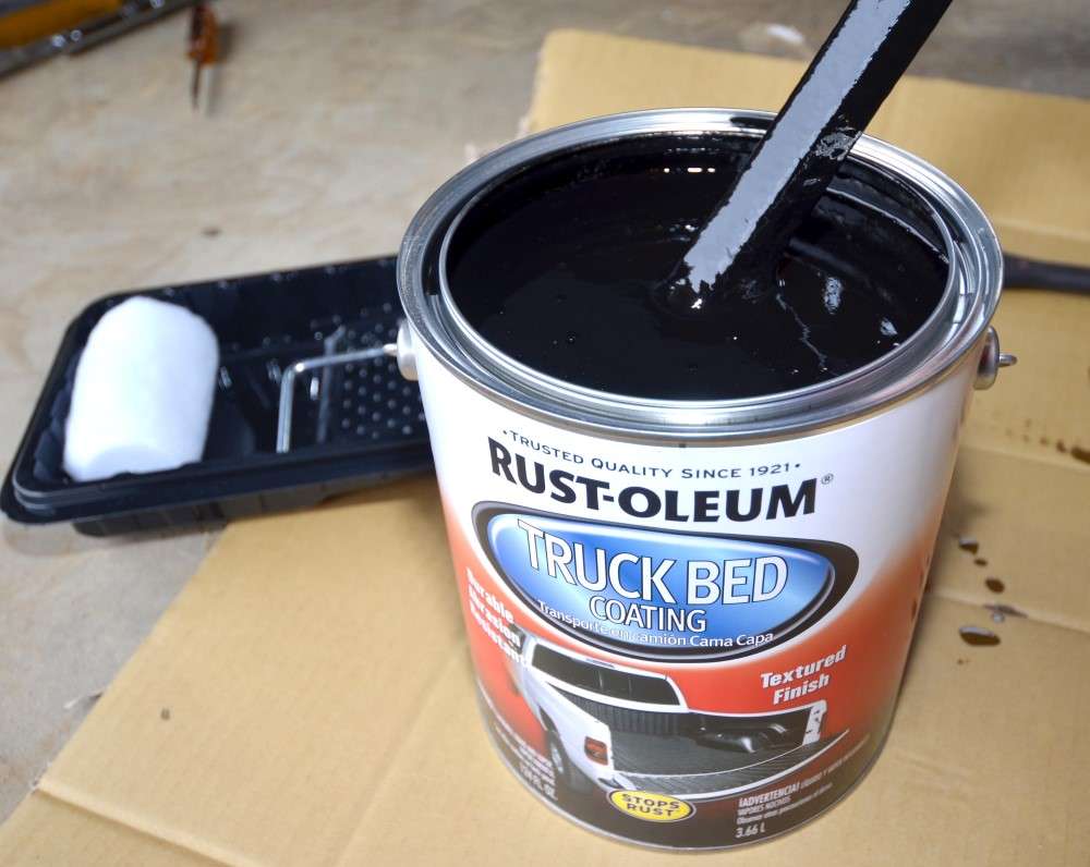 A gallon of Rust-Oleum Truck Bed Coating was enough to give my trailer two coats. Mix the coating thoroughly before applying.