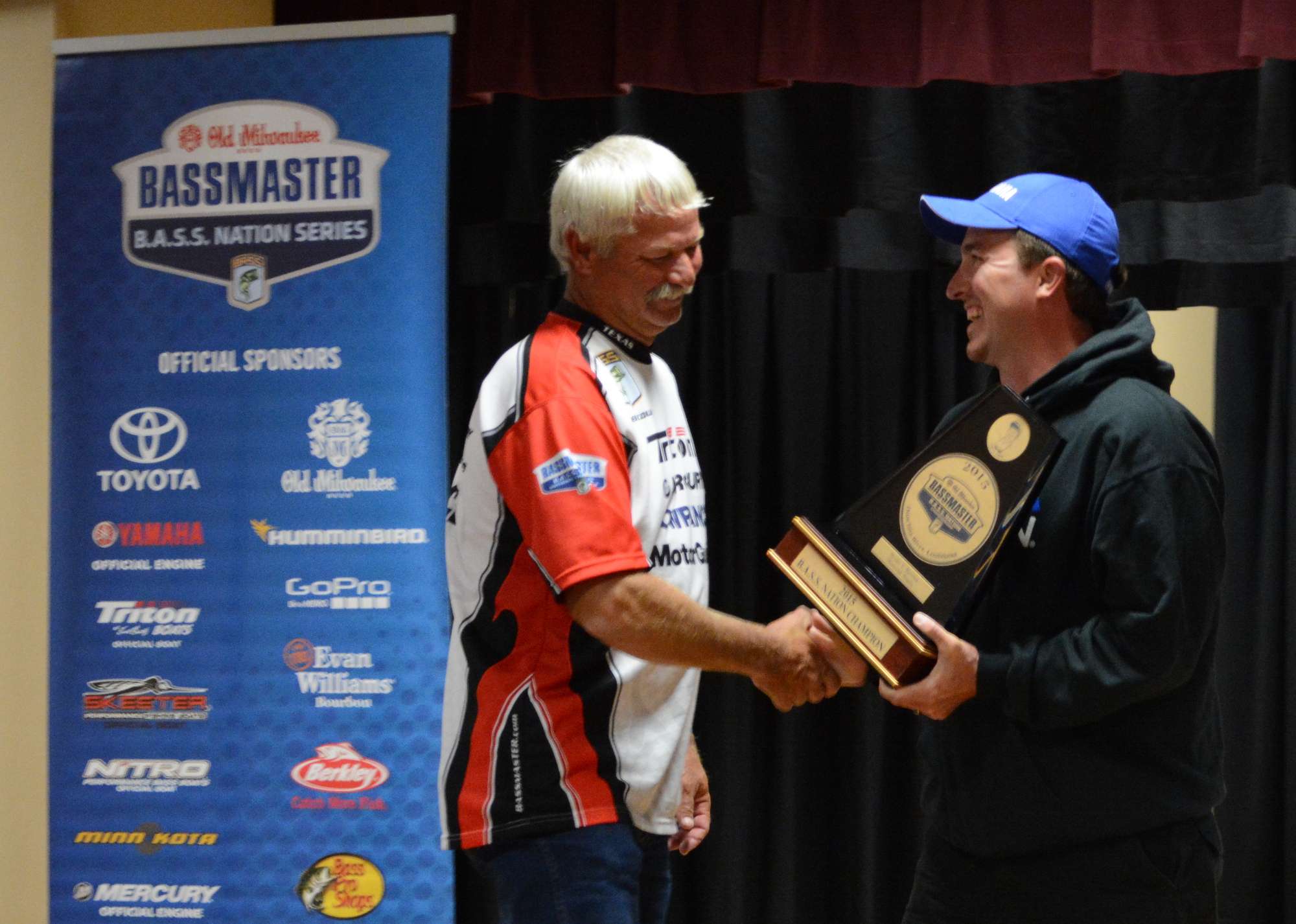 Mueller handed off the Bryan V. Kerchal Memorial Trophy to Albert Collins, winner of the 2015 Old Milwaukee B.A.S.S. Nation Championship.