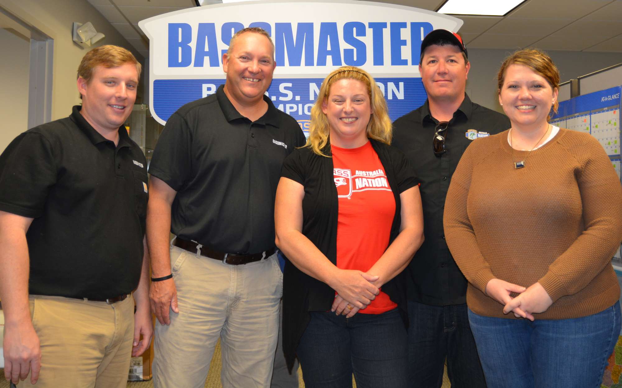 From left are Hank Weldon, manager of B.A.S.S. youth; Jon Stewart, director of the B.A.S.S. Nation; Kelly and McGrath; and Emily Hand, B.A.S.S. Nation coordinator.
