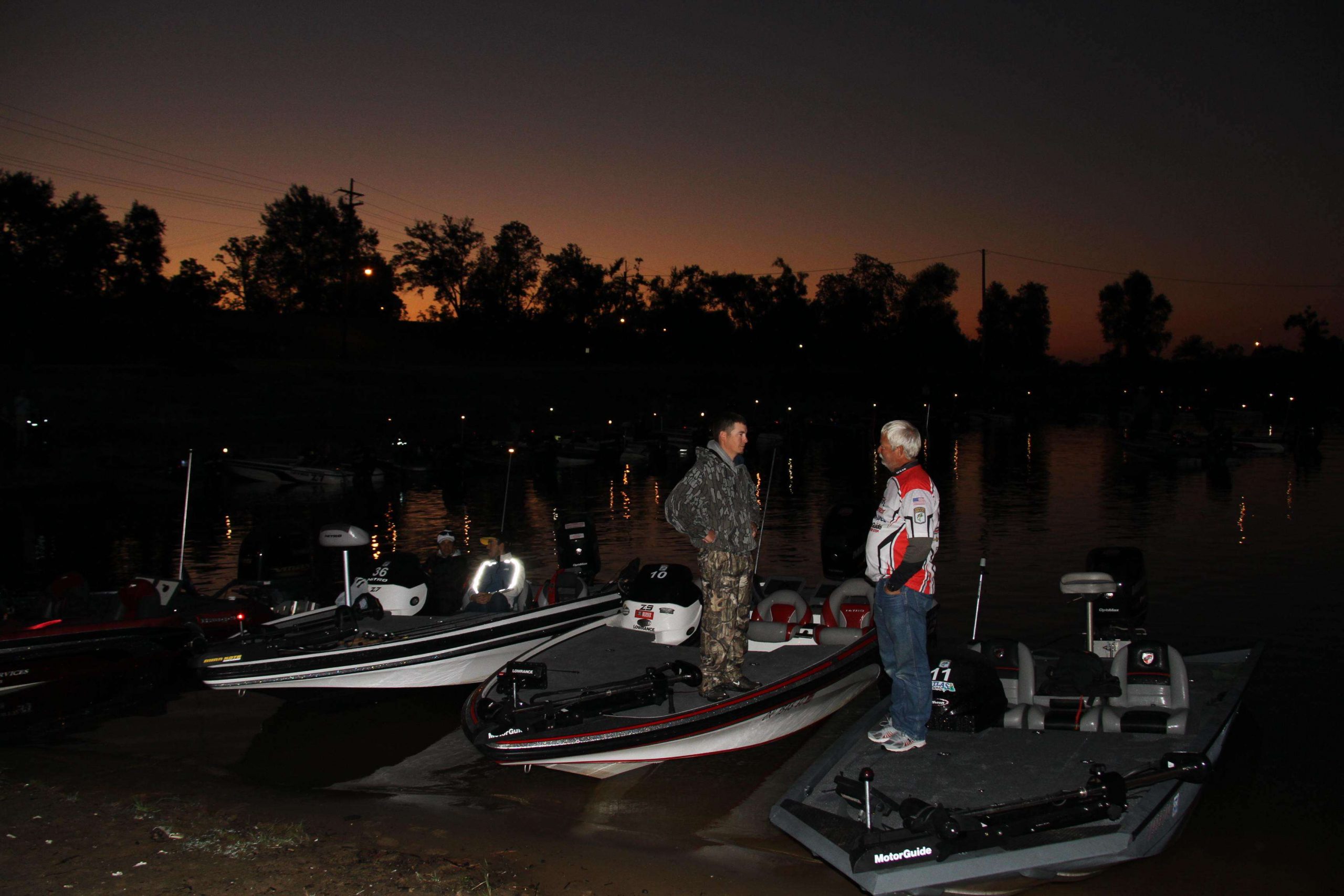 Preston Frazell of Kansas and Albert Collins of Texas get ready to head out onto the Ouachita River.