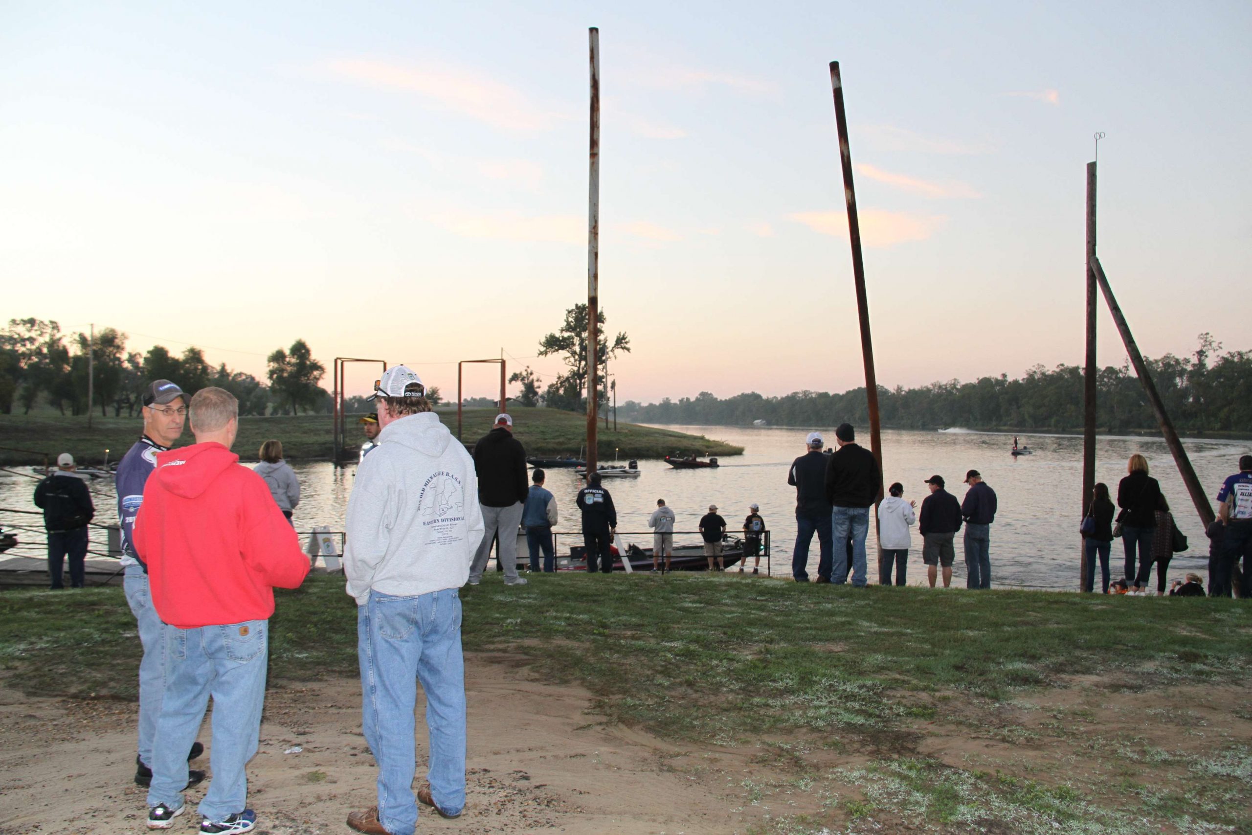 Family, friends and fans line the banks, wishing the anglers well.