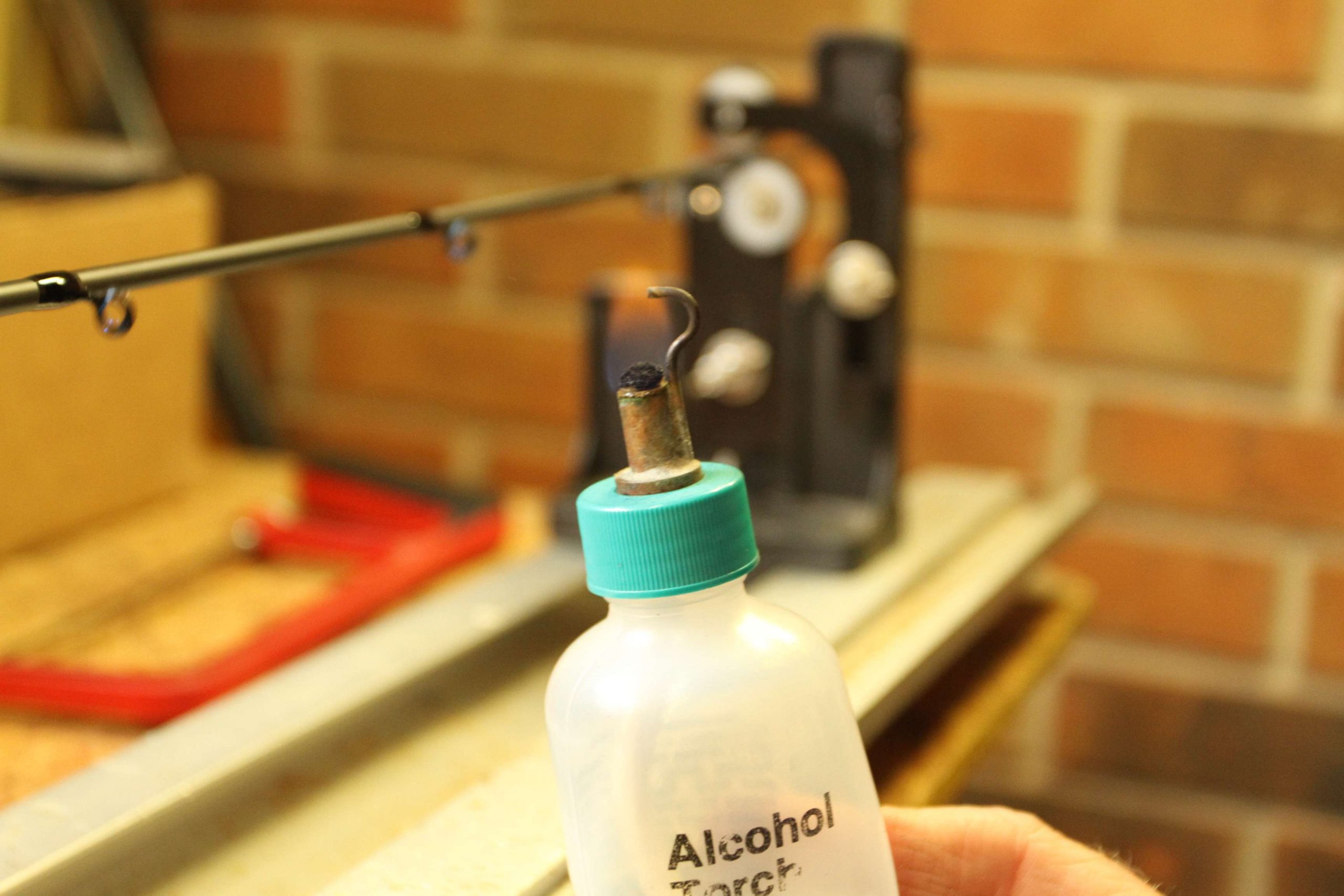 Once each guide has been coated, he keeps an alcohol bubble torch on hand. This nifty tool is used to remove any bubbles and imperfections that may occur when the flexcoat is applied. 