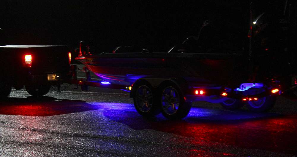 This team rolls into the boat ramp with their LED lights glowing under their boat. Any source of light early in the morning is very helpful for anglers and photographers alike.
