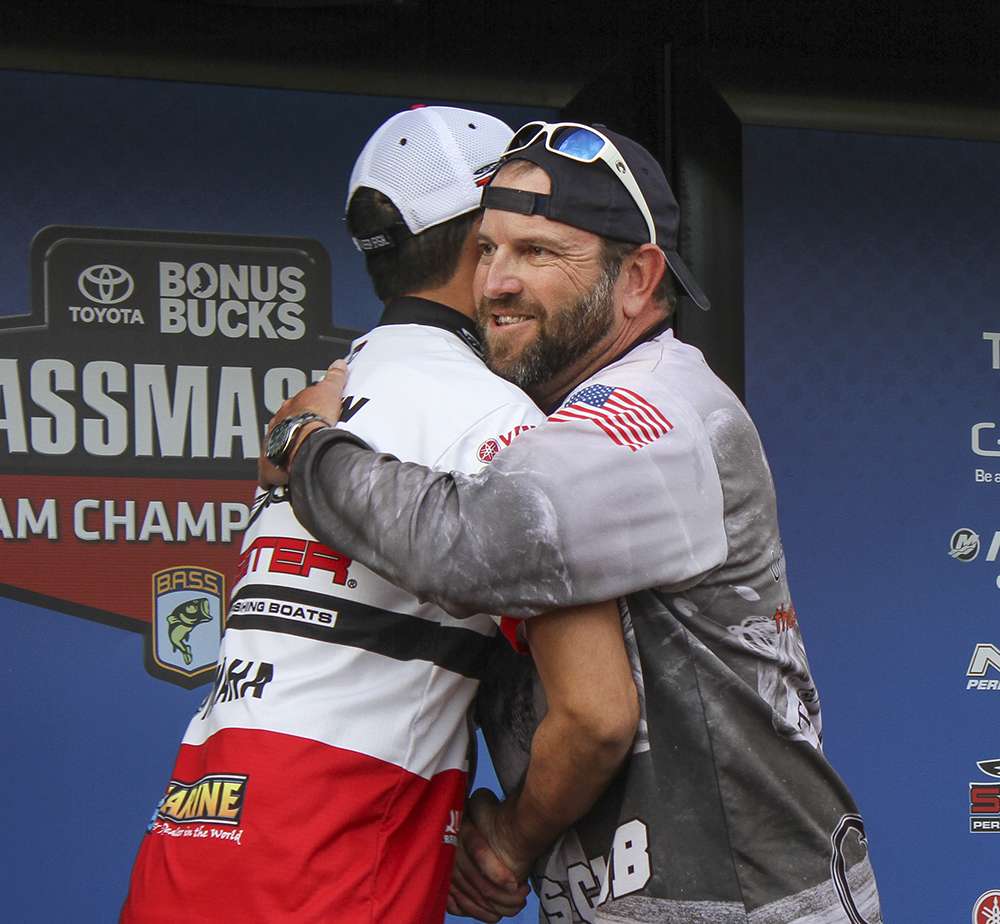 The fierce competitors embrace as Martens clinches his Classic spot.