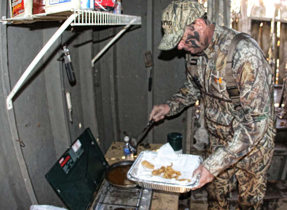 And preparing a meal like no other on a cool, day in the duck woods of Kansas.