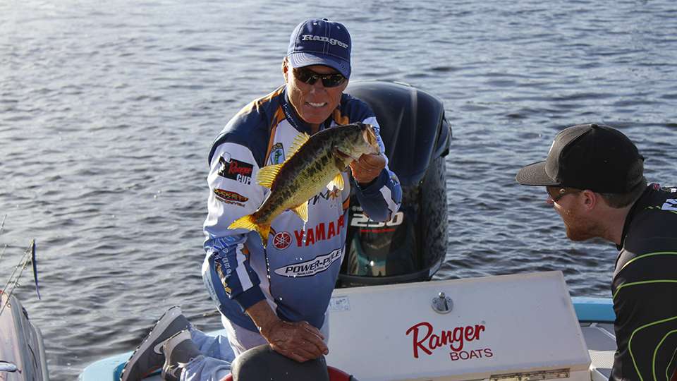 His boater, Terry Segraves decides to get in on the photo action and he holds up one of his fish from Day 2.