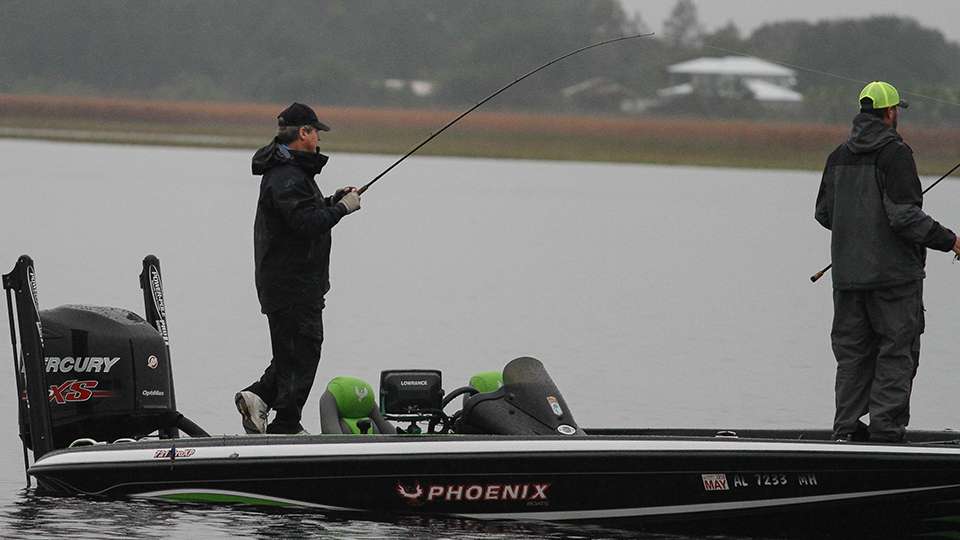 Soon after they mentioned it, co-angler Fred Rigdon sets the hook on a fish.