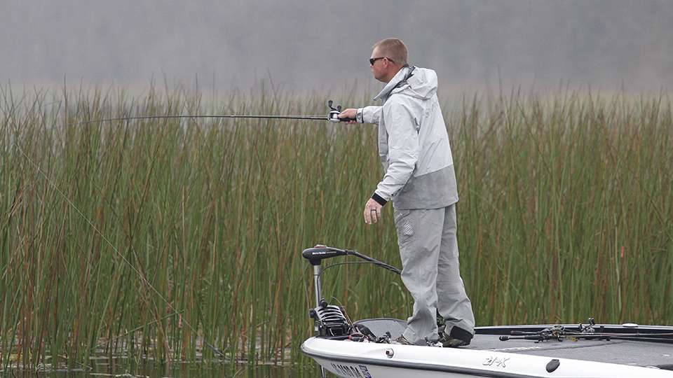 South Carolina angler Travis Dehart flips the clumps of reeds and also switches it up in the open areas.