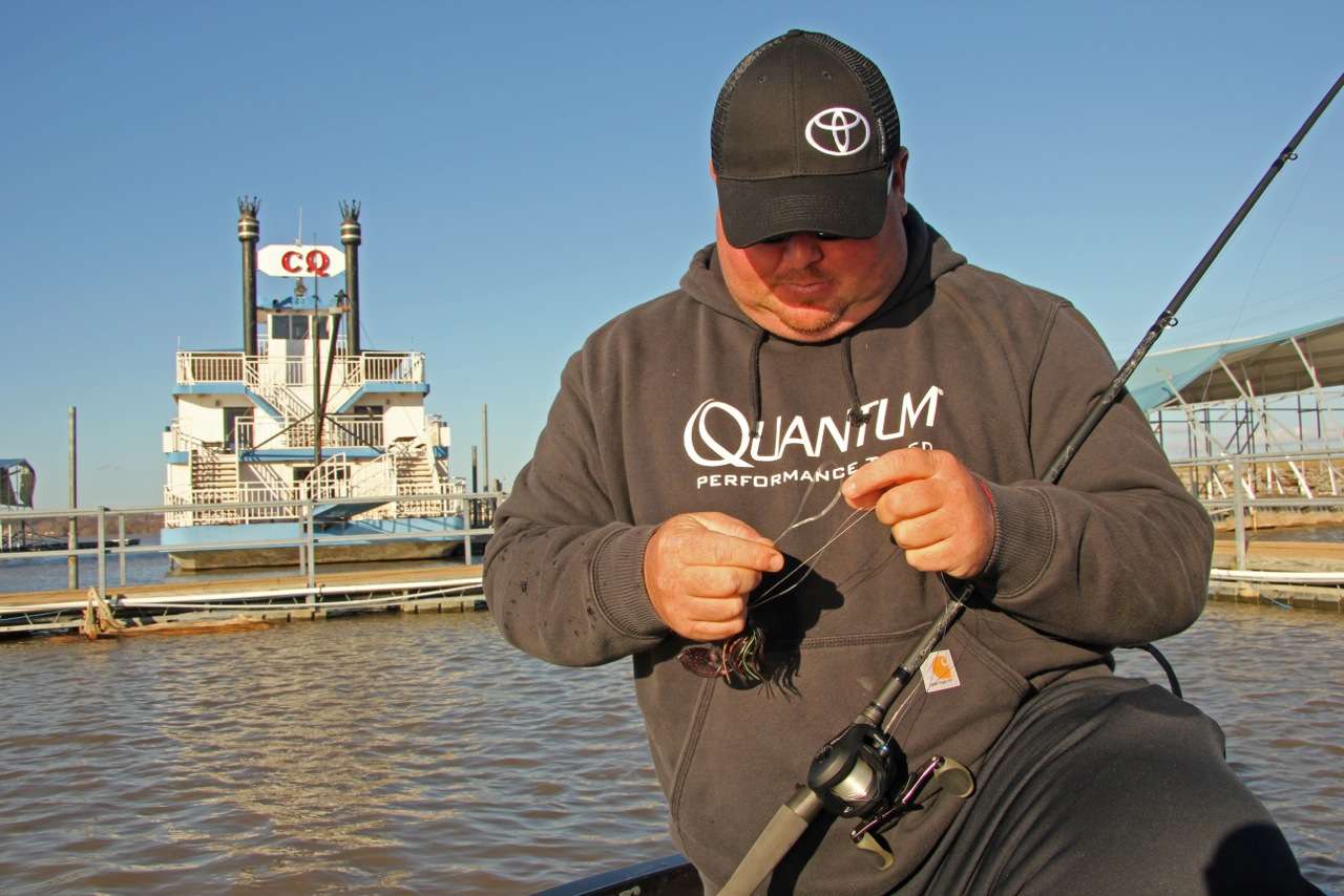 The Prince George, Va., pro who loves to waterfowl hunt in the winter and chase cobia in the summer on Chesapeake Bay, takes a minute to retie a jig near the Cherokee Queen.