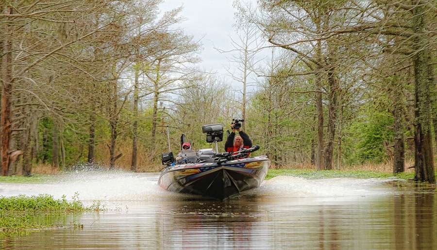 Cameraman Rick Mason records the trip through a swamp with Shaw Grigsby, during the March event on the Sabine River. 