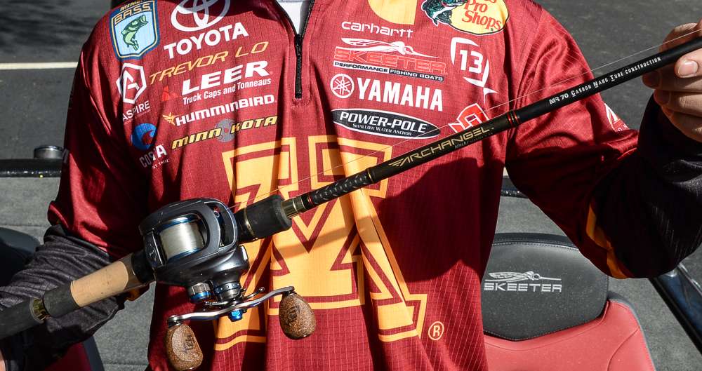 Here Lo shows off his favorite combo, a 13 Fishing Archangel and a Concept E baitcaster.