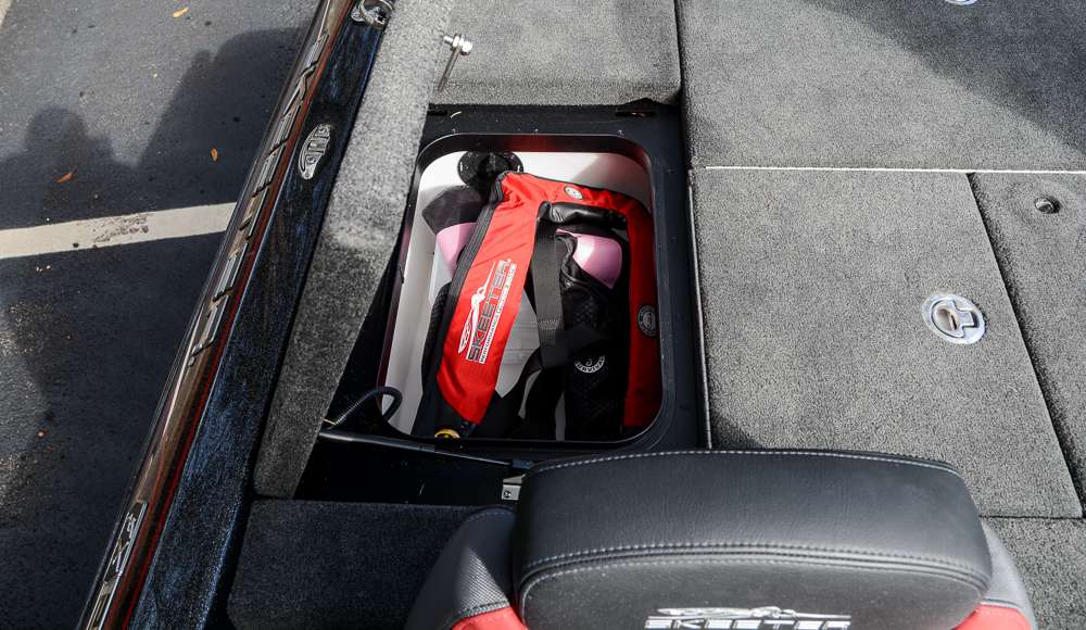 Behind the driver's seat is another storage compartment where he will keep life jackets.