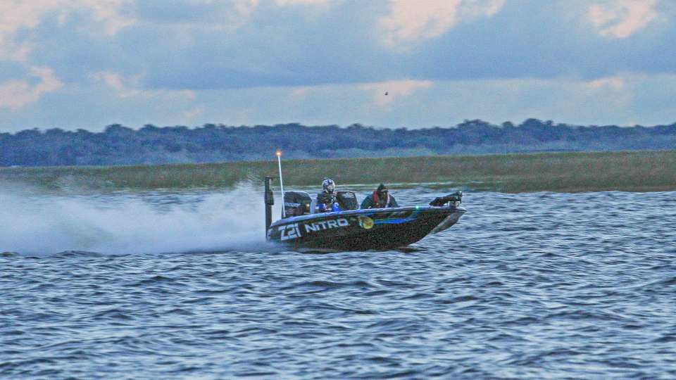 Bassmaster Elite Series Pro Ott DeFoe speeds by as he has his Nitro trimmed up and screaming down Lake Toho.