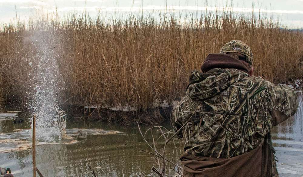 Every once in a while, the moving tide would pull a sheet of ice out of the marsh and into the decoys, requiring a long-distance break up with a well placed shot.