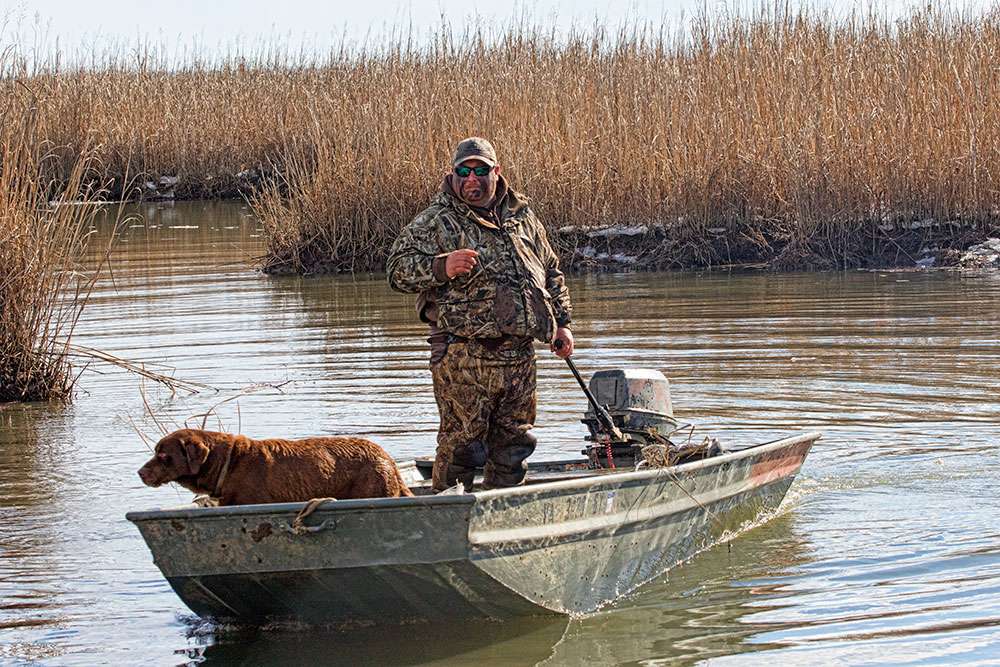 With the morning hunt over, Powroznik would gather the boat, the decoys and the retrieverâ¦