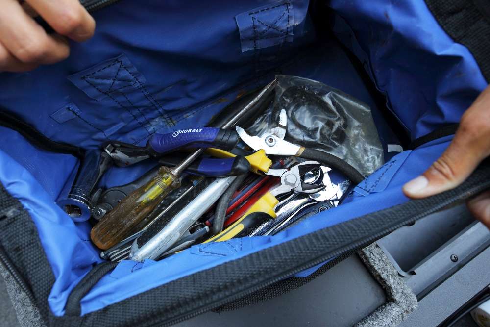 The sturdy zip-up bag keeps all the tools Lucas may need in one convenient place, and it prevents the tools from flying loose when the boat bangs around on waves or rough water.