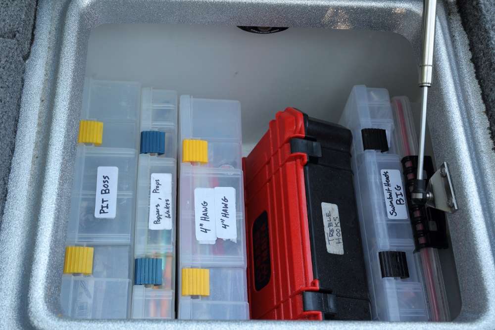 A compartment behind the driver's seat is home to additional tackle boxes. These are all clearly labeled so there's no confusion about their contents.