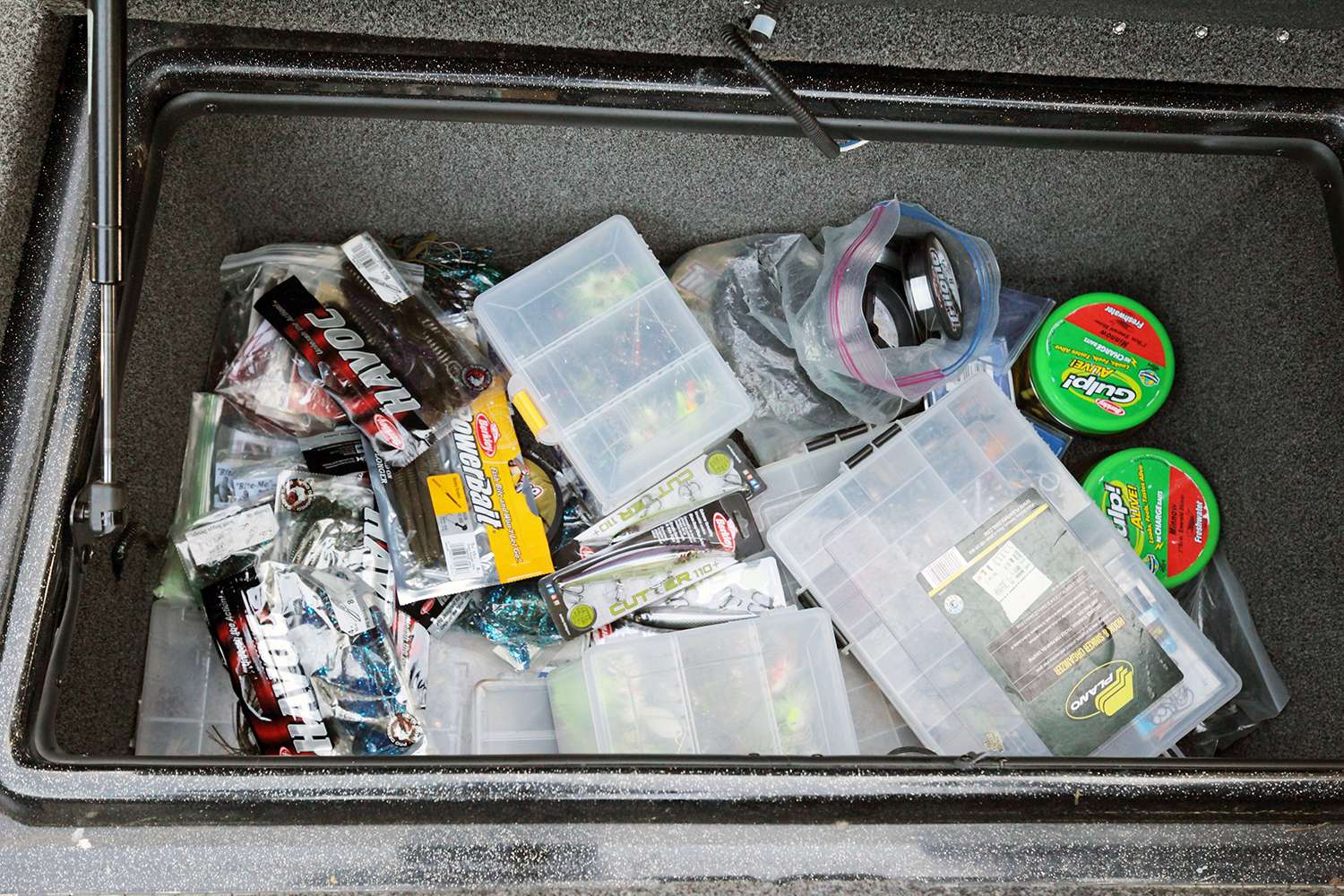 The boat's front box was a frequently used storage space that held a wide array of fishing gear. Plastics, spinnerbaits, weights, line and Gulp! baits were all included.