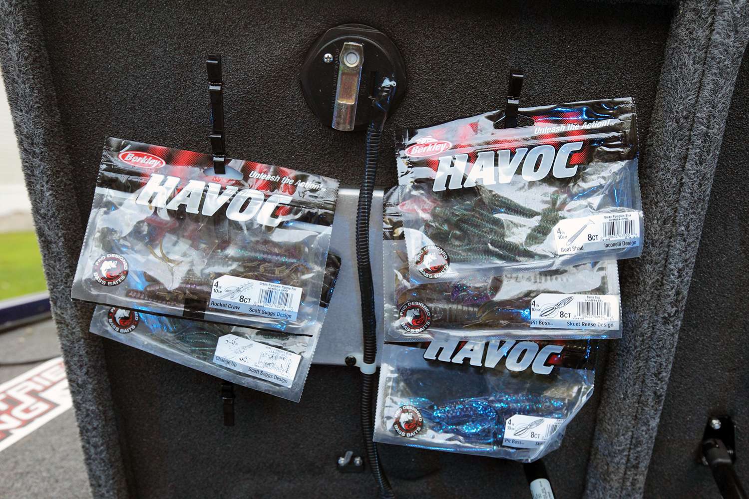 Rows of clips inside the compartment's lids provided handy access to bags of soft baits.