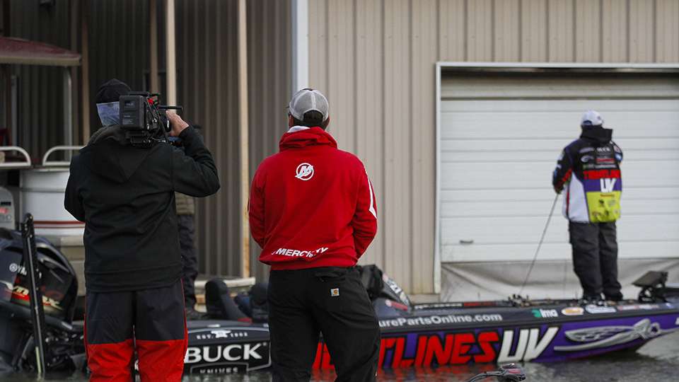 Soon after arriving, cameraman Wes Miller and former Elite Series angler Kevin Ledoux show up to get some shots for the Bassmaster TV show on ESPN2.