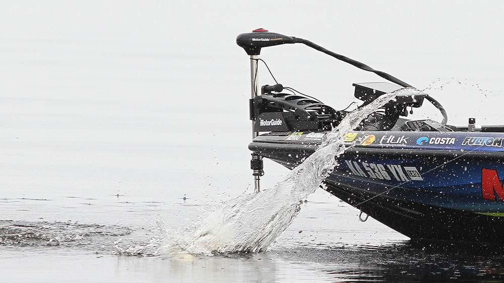 Chapman's bass is not happy about the situation and throws water all over the side of his boat. 
