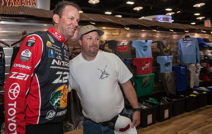 Kevin VanDam greets anglers in the HUK booth.
