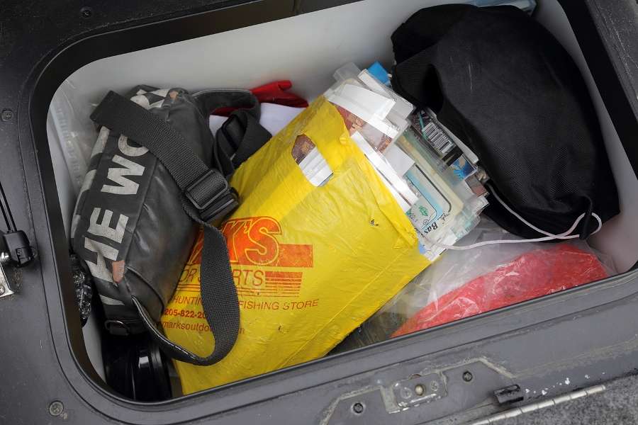 The box behind the driver's seat had some important items for Iyobe.
