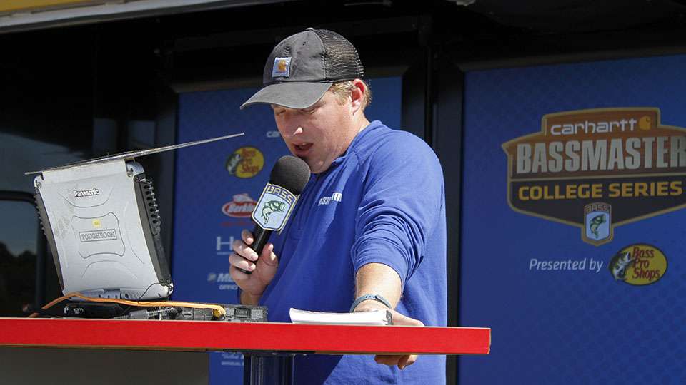 Tournament Director Hank Weldon briefs the crowd and viewers watching at home about the weigh-in that is about to take place on Day 2 of the Carhartt College Western Regional on Lake Mead.