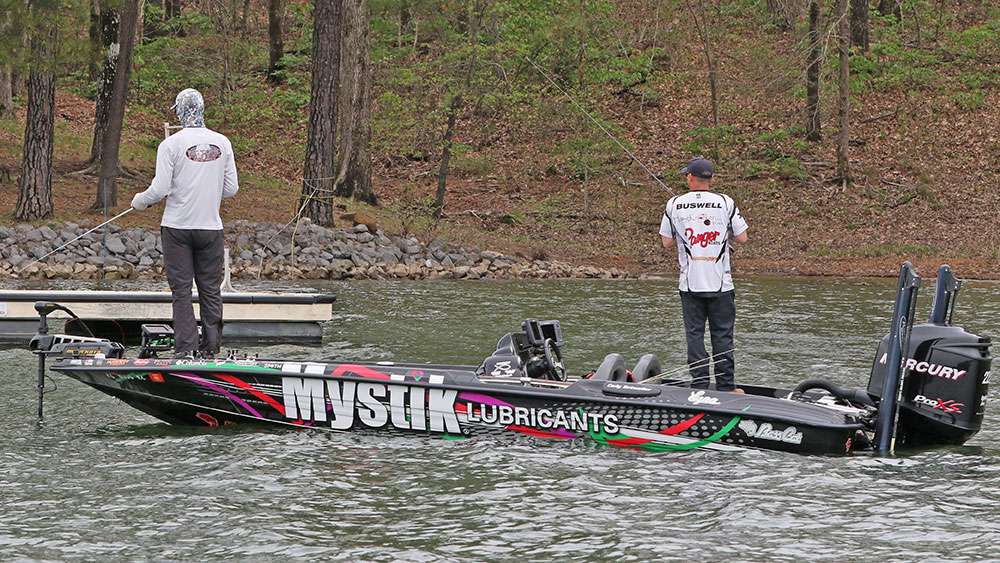 About a mile down the bank is Cody Petweiler and his co-angler Daniel Buswell. The duo is working rocky banks behind docks and tapering points. 