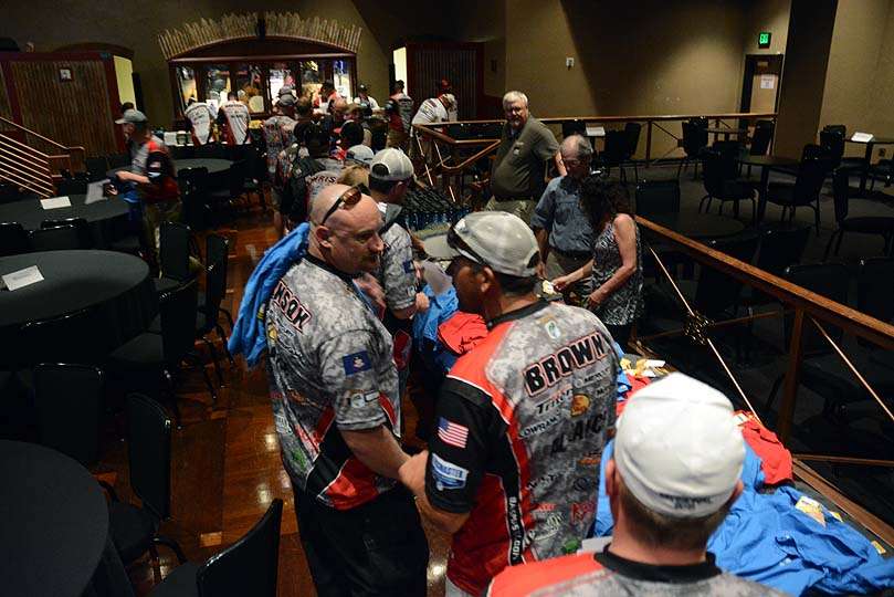 Teams collect gifts from Nationwide, Carhartt and B.A.S.S. as the anglers advance through the line. 