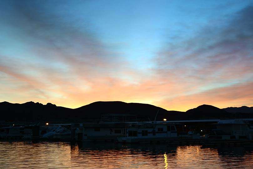 The sun begins to rise over Lake Mead and Callville Bay for the start of the tournament. 
