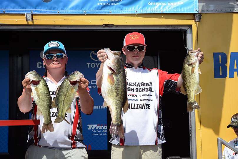 Jake Mims holds the 7-pound, 2-ounce largemouth that won him Big Bass honors. Heâs with teammate Noah Rega from Alexander High School in Douglasville, Ga. 
