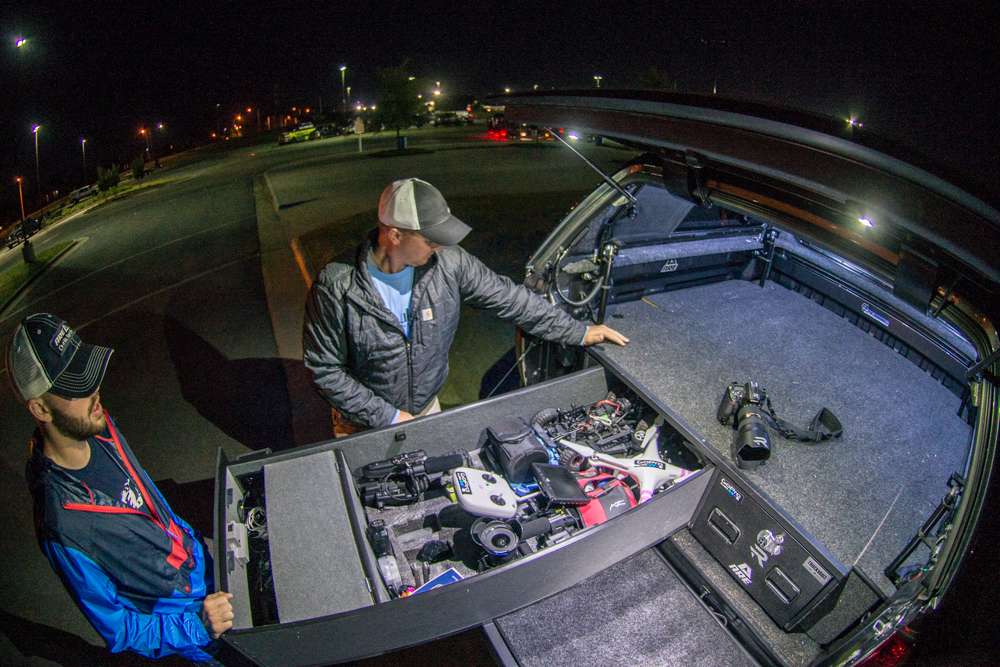 Photographer Chris Brown digs into his truck for his drone, time to fly! 