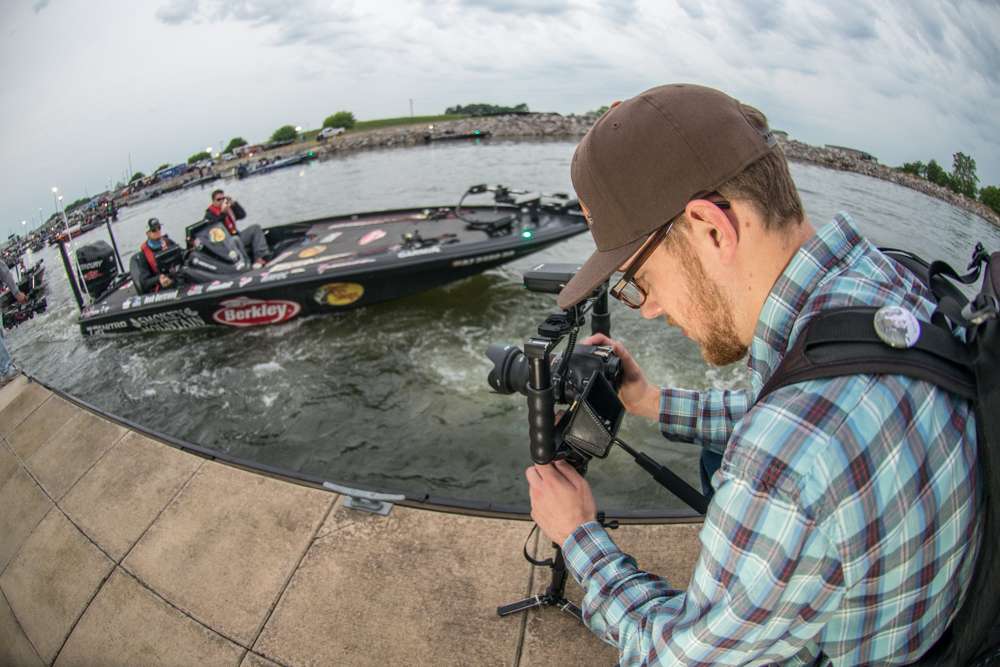 Josh Bertrand motors by the dock as Chris Shangle captures some slow motion footage. 