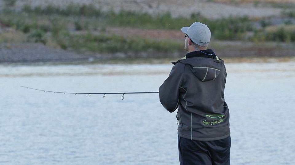Josh Worth flings a spinning rod to a deep spot in hopes of hooking up with a smallmouth.