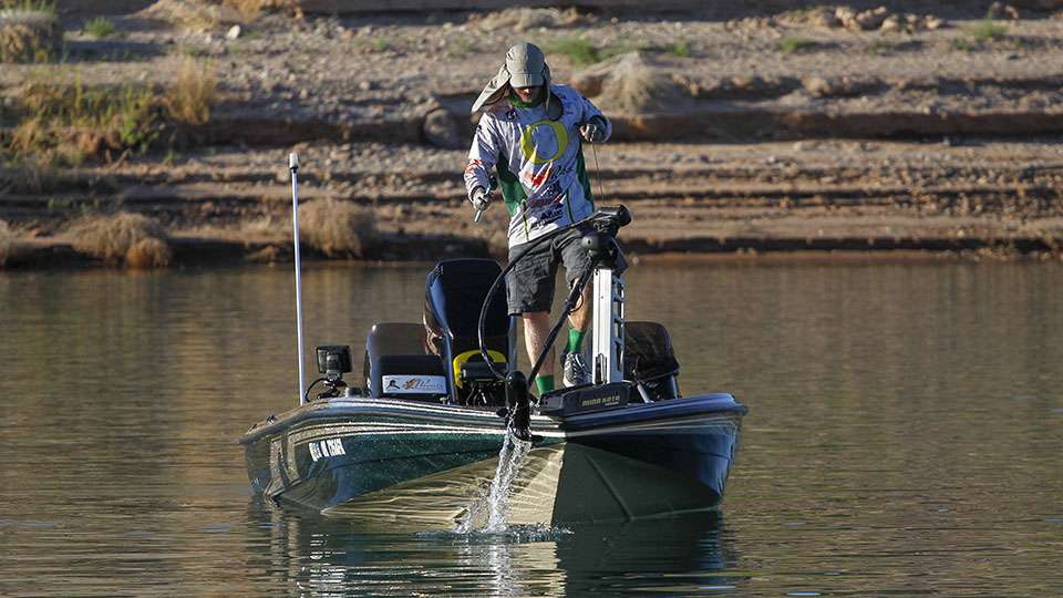 After fishing for a few more minutes he pulls his trolling motor up to head to a fish he found on a bed.