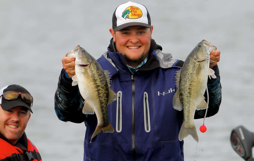Joey Nania with two nice spotted bass that are so abundant in Smith Lake. 