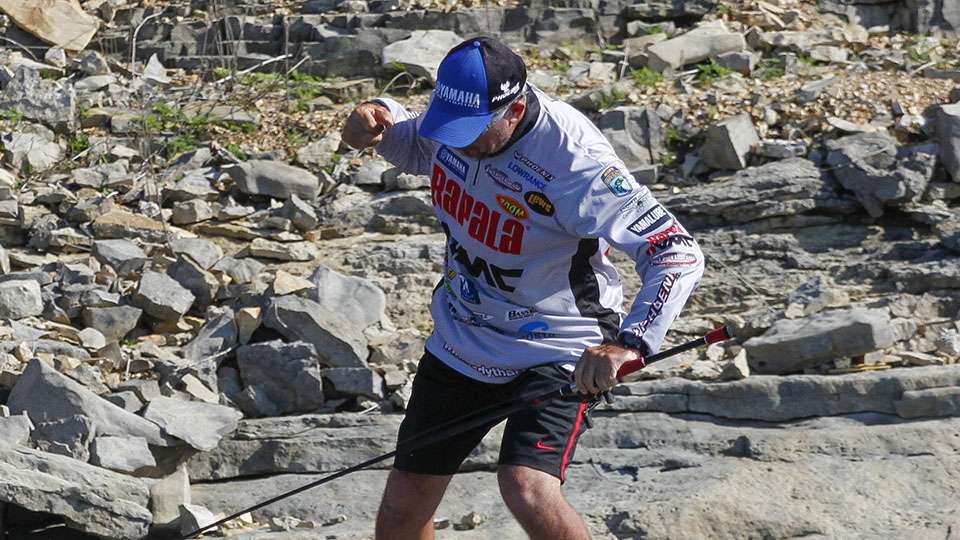 Boom! Tharp gives a major fist pump after catching that fish. He knows it is a game-changer.
