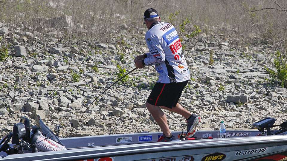 Tharp gained leverage on the fish at the side of the boat as he went to swing it.