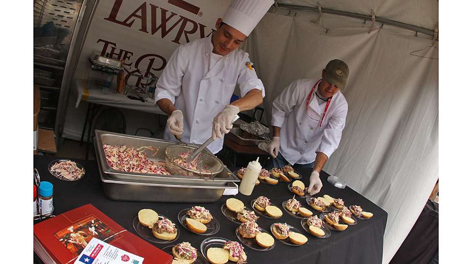 More prime rib could be found from Lawryâs The Prime Rib booth. The chefs add slaw to their sliders.