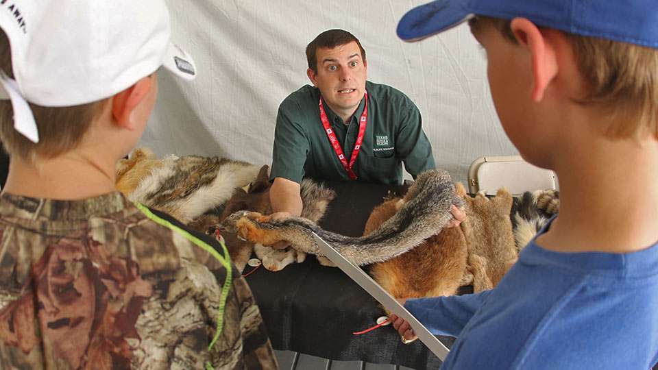 Sam Kieschnick of the TPWD Wildlife Division gets animated as he discusses the fur-bearing animals native to Texas. 