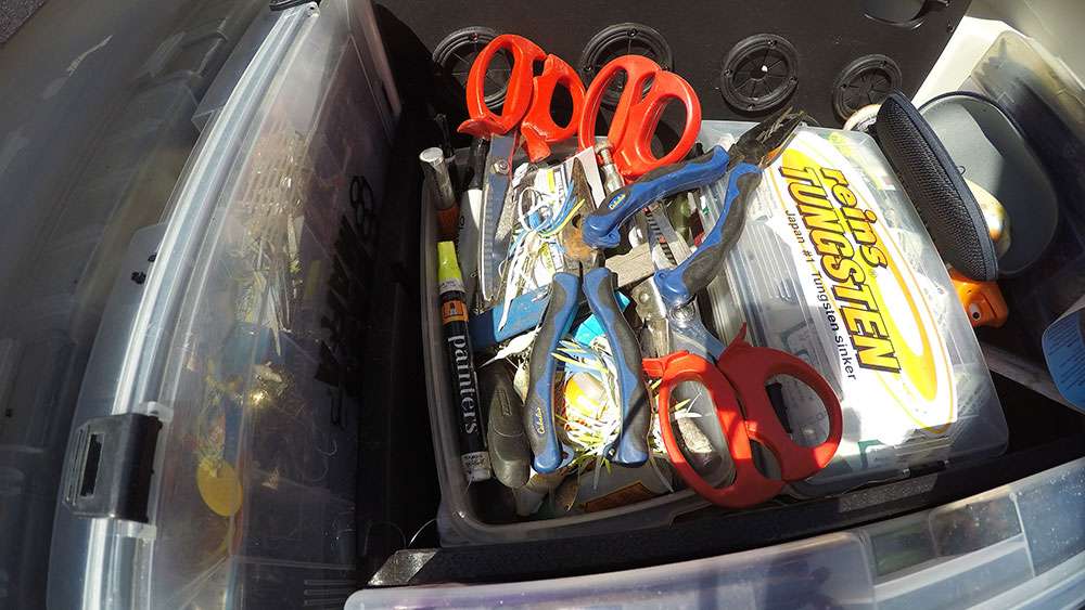 In the middle of all that tackle is a catch-all bin that has cut-off baits and other necessary tools. 