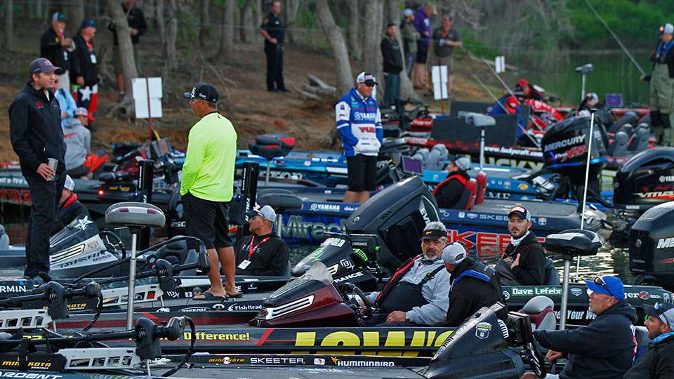 The anglers line up along the shore waiting for the 7 a.m. blastoff.