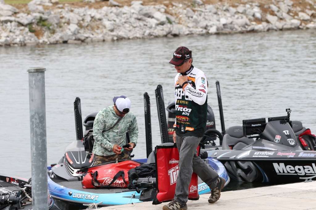 Gary Klein carries his Day 3 catch to the backstage area. Klein squeaked into the Top 12 after a tough day on Wheeler Lake.