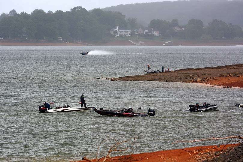 Rain falls on Douglas Lake as the first boats arrive at 2:15 p.m. for the Day 2 weigh-in. 