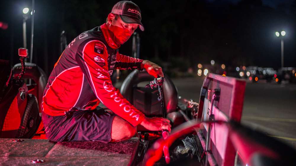 Kevin began to pull out his rods and get his tackle organized for Day 3. 