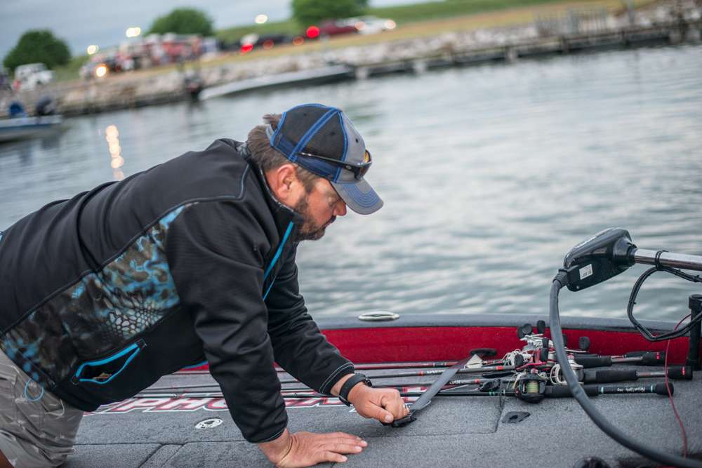  Current AOY leader Greg Hackney straps down his rods for the quick ride to his first fishing spot. 