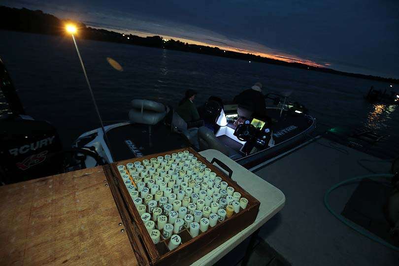 Day 1 begins with a box filled with numbered boat fobs. There are 150 boats in the tournament on Douglas Lake. 