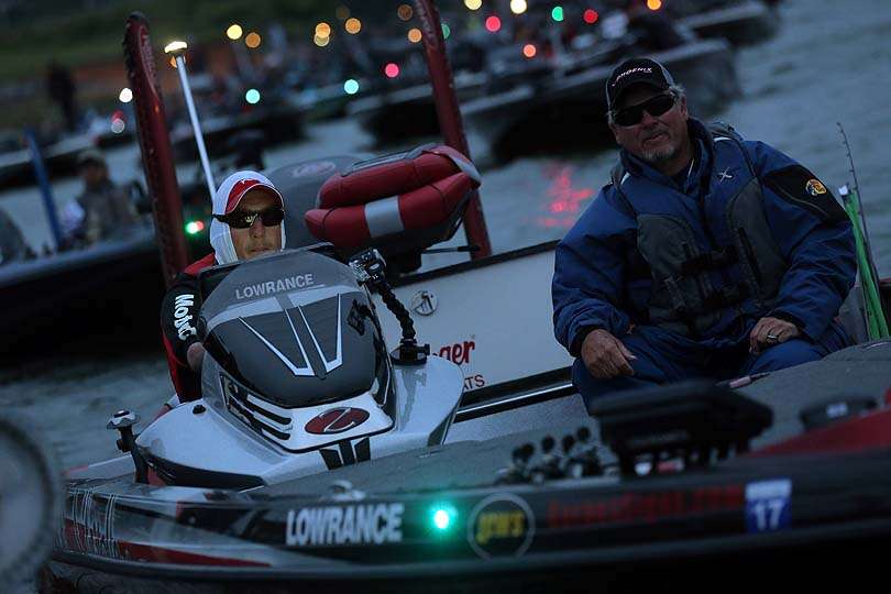 Clay Dyer is ready for a long run across the chilly lake. The bass are in post-spawn mode and that means lots of moving around to find their locations. 